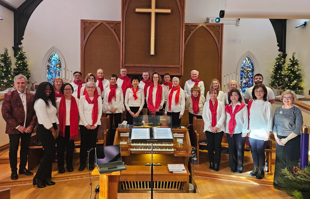 The Central United Church choir posing for a photo after a choir performance